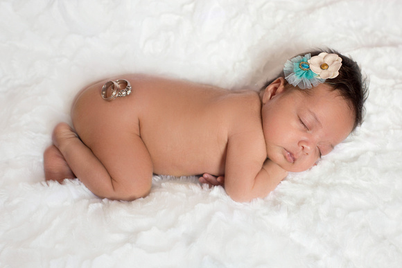 K.D. Elise Photography company's image of Pueblo Newborn baby girl.