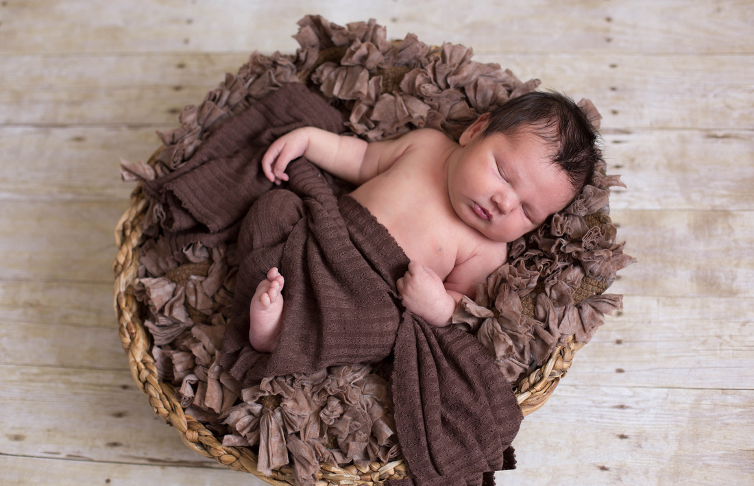 Pueblo Newborn Photographer baby photos of eight day old Donald. 