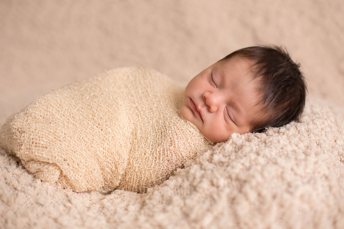 Six day old baby girl Evalynn's  newborn photography session by Pueblo photographer K.D. Elise Photography.