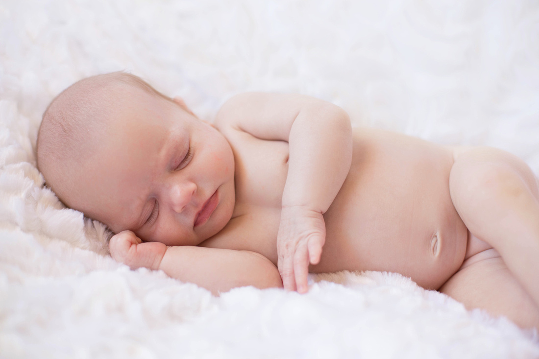 Pueblo Photographer K.D. Elise Photography's image of newborn baby girl MaKayla.
