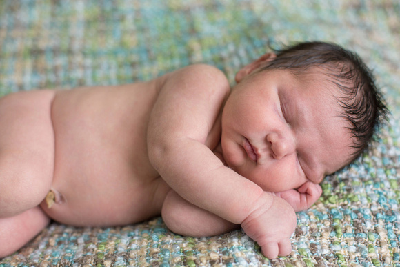 Photo of sleeping newborn baby boy.