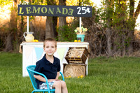 Lemonade stand themed summer children's photos by Pueblo photography company K.D. Elise Photography